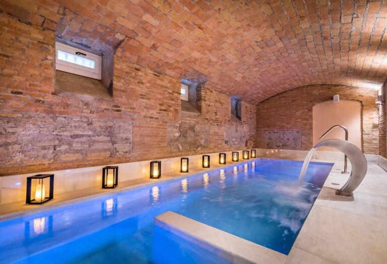 Calm spa treatment room at Palacio Gran Vía boutique hotel, Granada, Spain