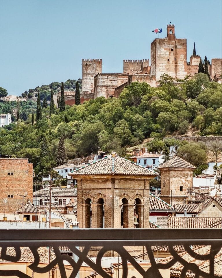 View of the Alhambra palace from the rooftop terrace of Palacio Gran Vía, Granada