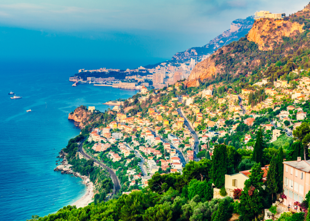 Panoramic view of Monaco's coastline, hillside homes and the Mediterranean Sea along the French Riviera
