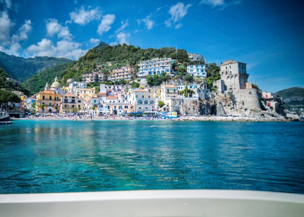 Colorful waterfront and fishing boats in the seaside village of Cetara on the Amalfi Coast.